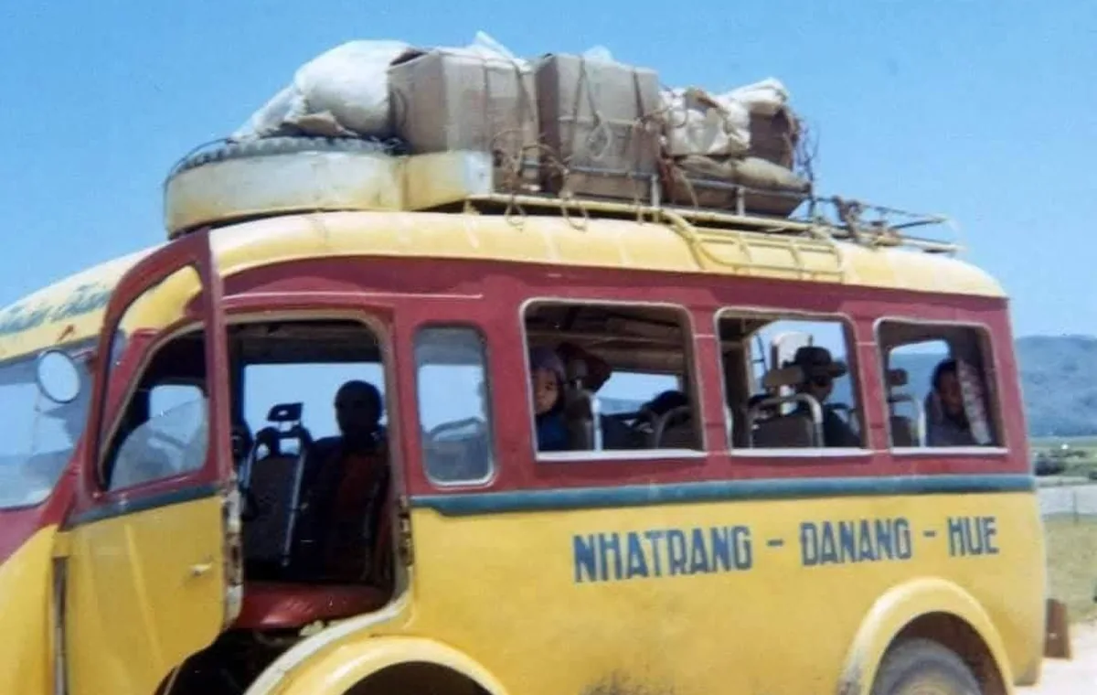 An old Vietnamese xe đò intercity bus on the highway
