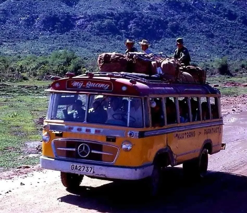 An old Vietnamese xe đò intercity bus on the highway 6