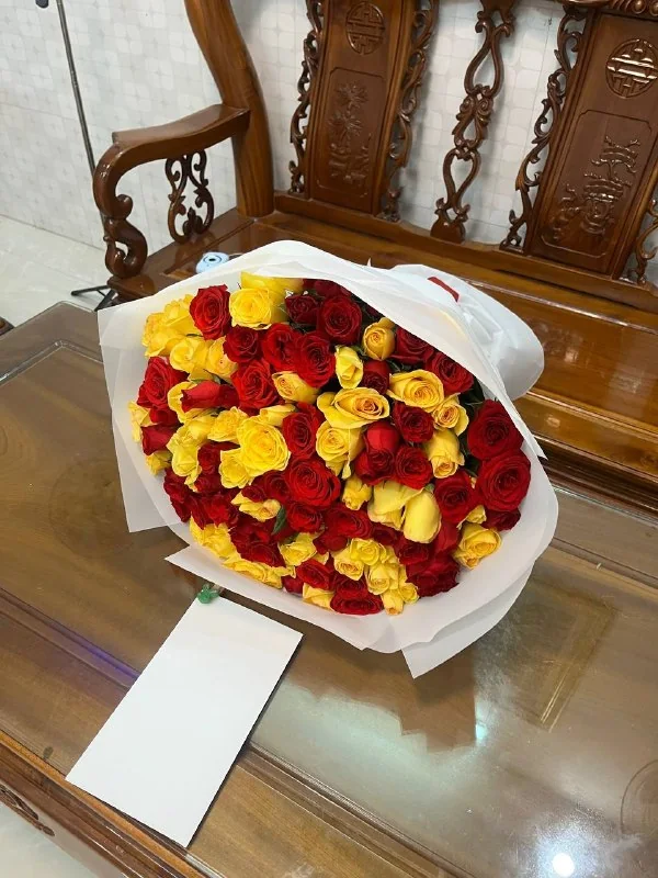 101 yellow and red roses in white wrapping with a card Nha Trang delivery 3