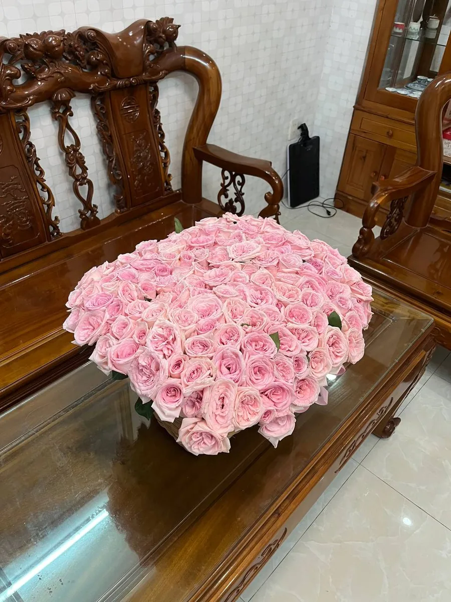 151 pink roses in a basket with a pink ribbon Nha Trang delivery 3