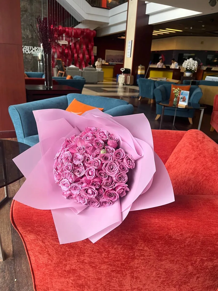 51 violet roses in white wrap delivery Nha Trang 2