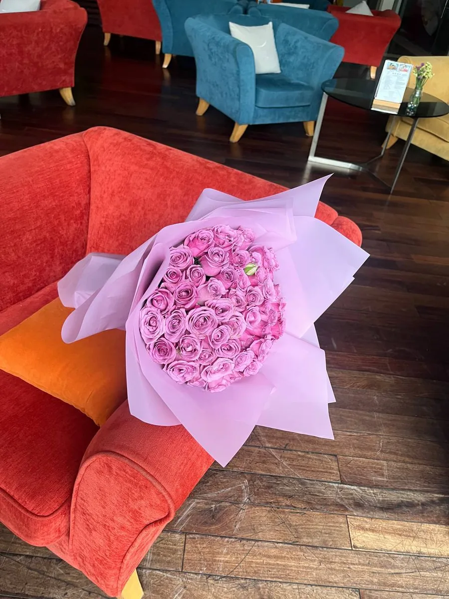 51 violet roses in white wrap delivery Nha Trang 3