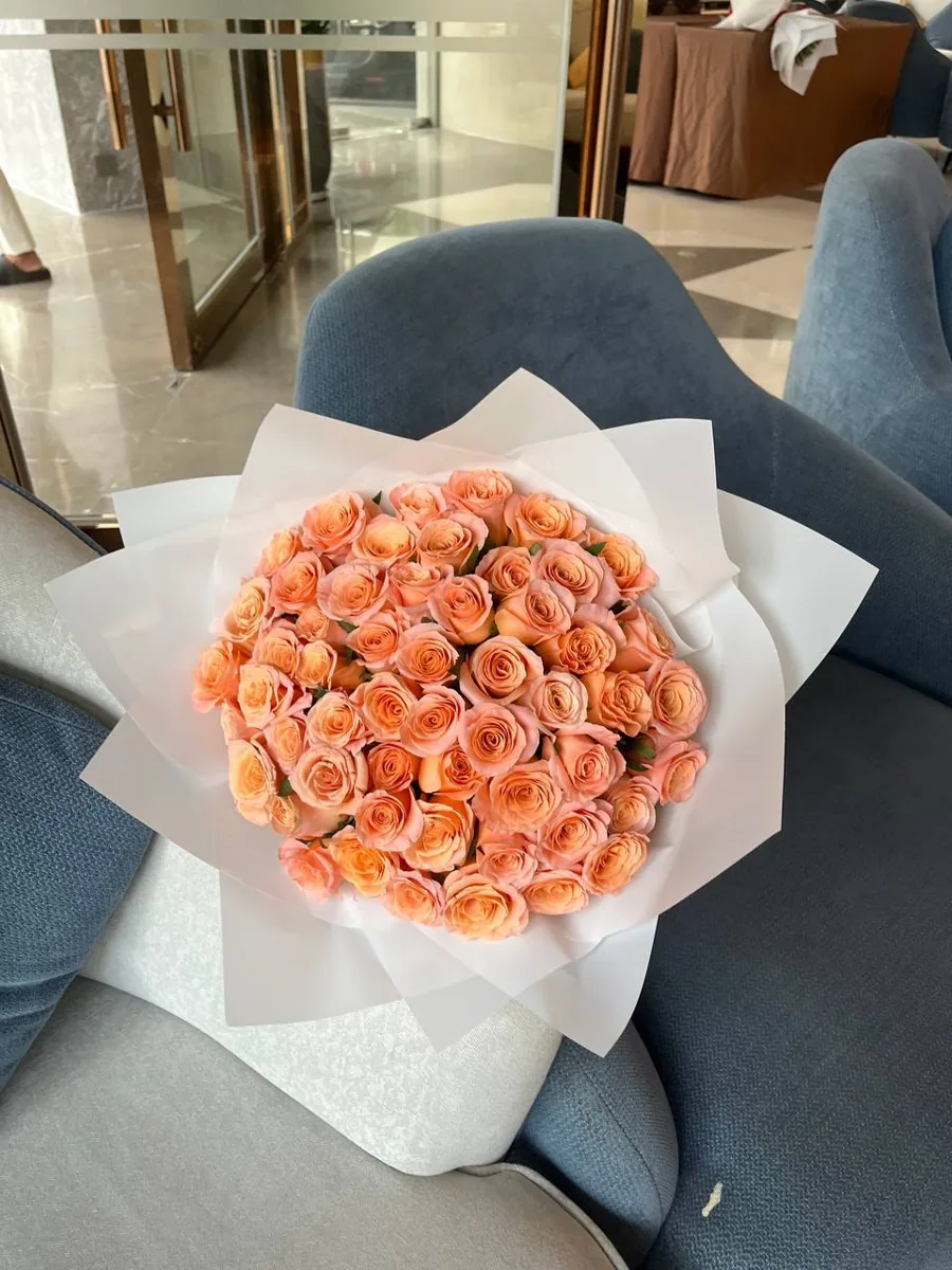 51 coral roses in white wrap delivery Nha Trang 4